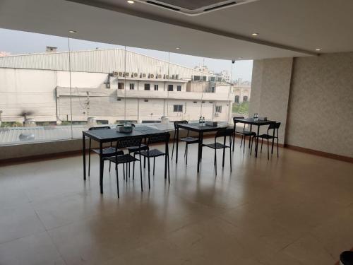 Restaurant, GRAND MANOR SUITES near Sudha Cars Museum