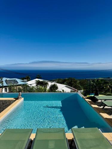 La Villa Des Oliviers chambres d hôtes - Chambre d'hôtes - Petite-Île