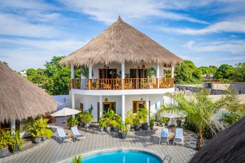 Exterior view, TinJaLa Lodge in Brufut