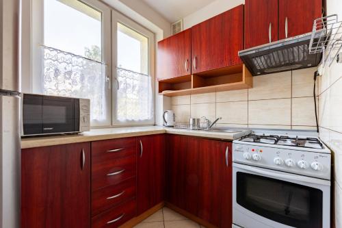 Cozinha, Grunwaldzka Comfort Apartment by BookingHost in Oliwa