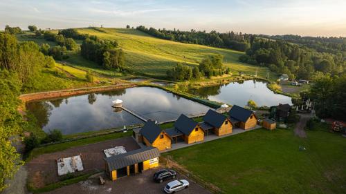 Domki Nad Stawami z Jacuzzi i Sauną 4