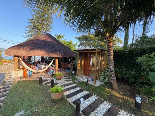 Casa maravilhosa pé na areia praia enseada para 15 pessoas com quiosque a beira mar – khách sạn tại Praia da Enseada