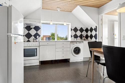 Comoditats, Døssinghus Holiday Apartments in Kjellerup