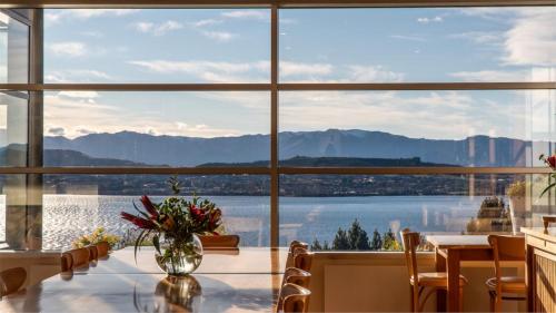 Strikingly designed in timber and glass in Glendhu Bay