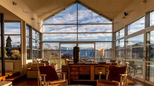Strikingly designed in timber and glass in Glendhu Bay