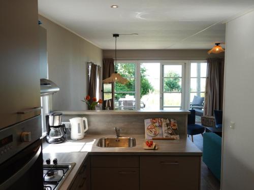 Kitchen, Strand49 Glamping Sint Maartenszee in Sint Maartensbrug