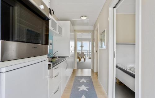 Kitchen, Amazing Apartment In Allinge With House Sea View in Sandkas