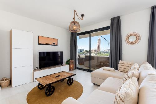 Penthouse moderne et cosy pour vos vacances accessible à pied depuis la plage (Penthouse moderne et cosy pour vos vacances accessible a pied depuis la plage) in ลา ลาสปารา