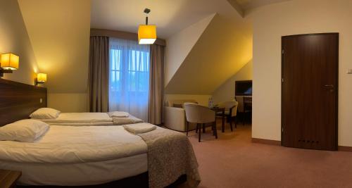 Hotel Dudek - Tap to explore photos