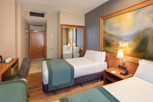 Triple Room room in Catalonia Excelsior Hotel
