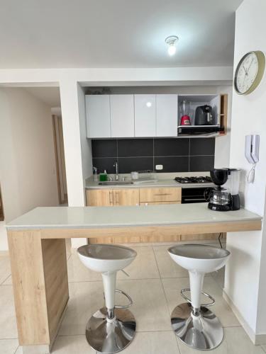 Kitchen, Full apartment near sports venues in Santa Rita
