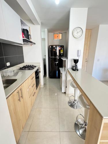 Kitchen, Full apartment near sports venues in Santa Rita