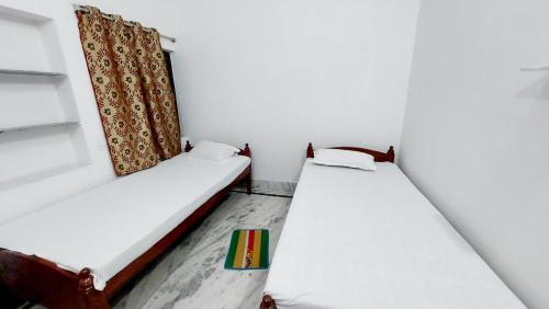 Double or Twin Room with Shared Bathroom room in Nilam Guest House