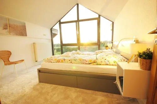 Ferienhaus mit Blick über die Felder und Golfplatz in Ratekau, Deutschland