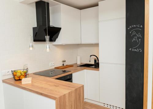 Krynica Apartamenty - Apartament typu studio Źródlana