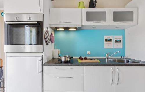 Kitchen, Amazing Apartment In Allinge With House Sea View in Sandkas