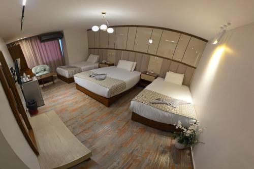 Triple Room room in Aura Garden City Hotel