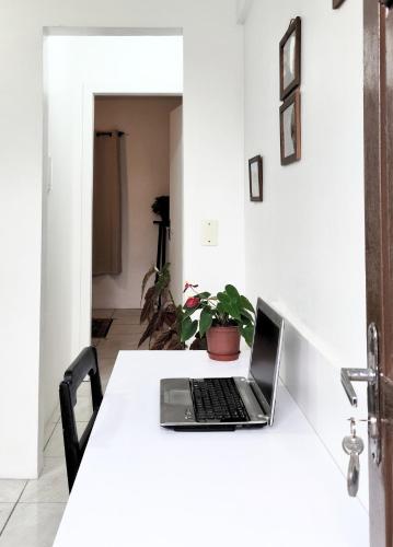 ทางเข้า, Studio Cravo e Canela - Aconchego e privacidade, ideal para casais, com cozinha completa, ar-condici in เซาชูเอา โดริโอเวร์เมลโย
