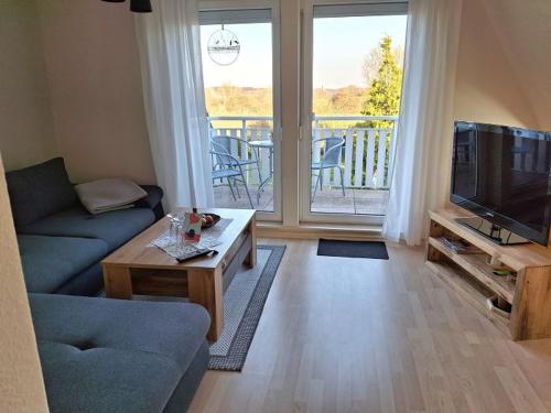 Ferienwohnung Janine in นอยบรานเดนบวร์ก