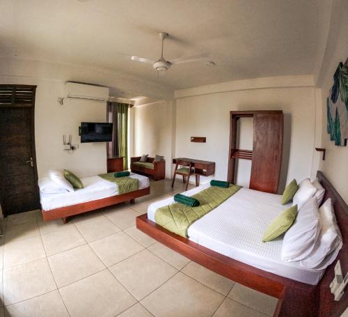 Deluxe Triple Room image 1