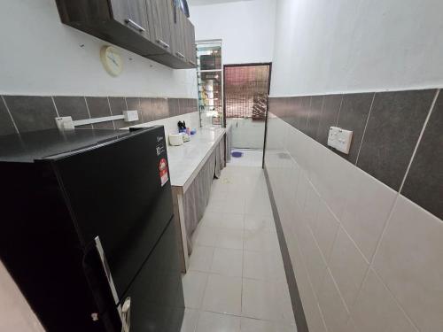 Kitchen, Hadi's Homestay near Rainforest Discovery Centre (RDC)