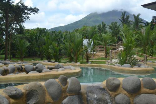 Hot spring bath, Volcano Lodge, Hotel & Thermal Experience in La Fortuna