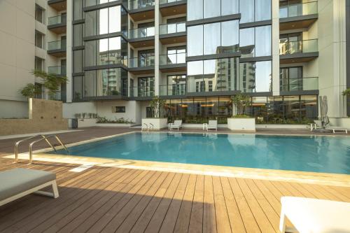 Swimming pool, STAY BY LATINEM Luxury 2BR Holiday Home OPA 305 Near Downtown in Nad Al Sheba