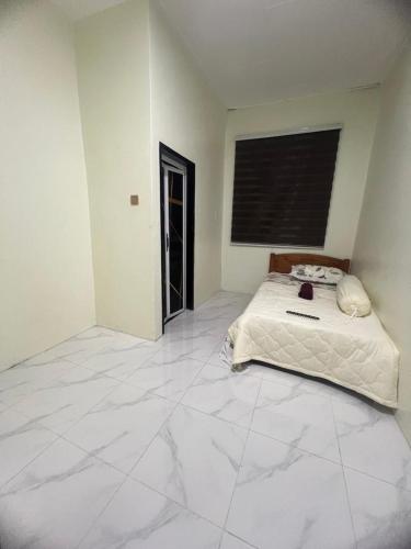 Rizqi Homestay Pasir Mas in ตุมปัต