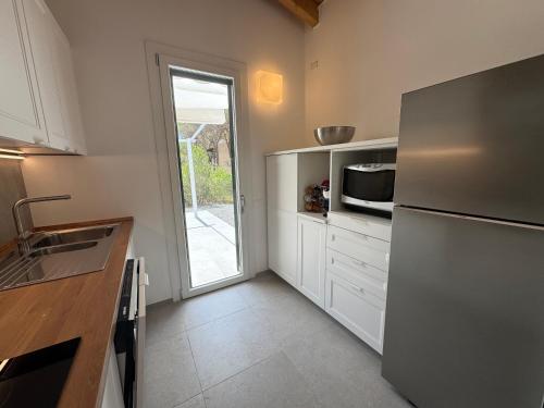 Cocina, FilMa Seagarden Villa in Santa Margherita di Pula