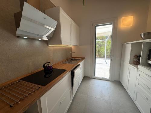 Cocina, FilMa Seagarden Villa in Santa Margherita di Pula