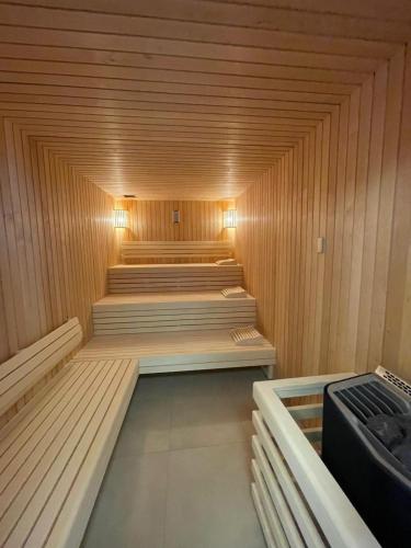 Sauna, Ferienwohnung direkt am Meer mit Pool und Sauna, Strand fußlaufig erreichbar, barrierefrei in Olpenitz