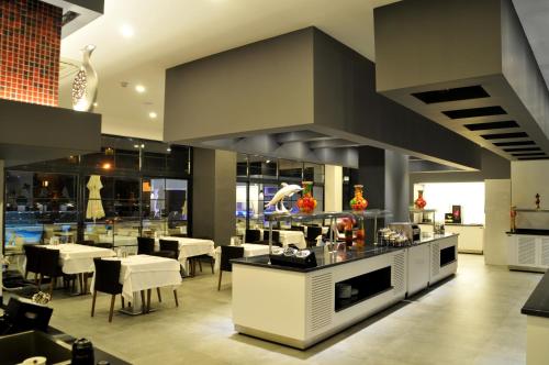 Green Garden Suites Hotel - image 5