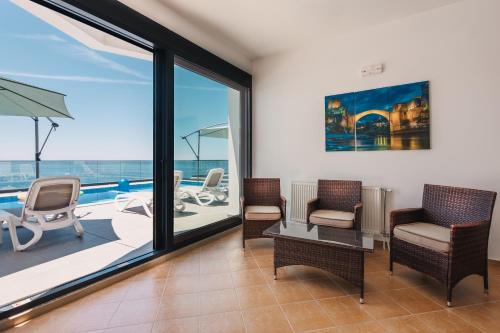 Seafront Villa with Private Pool in Dobra Voda, Montenegro in Dubrava