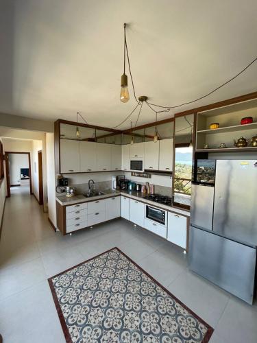 Jacuzzi e Piscina com Borda Infinita e Vista Incrível para o Mar (Jacuzzi e Piscina com Borda Infinita e Vista Incrivel para o Mar) in หาดอิตากวันดูบา