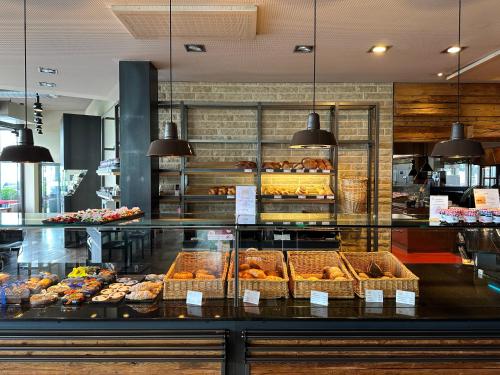 ห้องอาหาร, Steiners Business Hotel - Self Check-In in พเฟ็ฟฟิคเคอะ