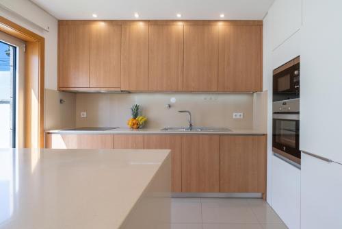 Kitchen, Stylish Home w/ Garage & Terrace by HostWise in Senhora Da Hora