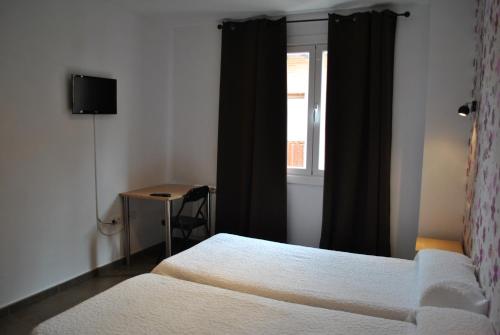 Hostal la Catedral Room Type - Twin Room