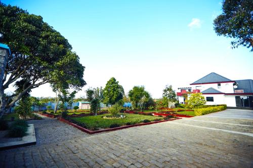 Сад, Cléo Hôtel-Restaurant (Cleo Hotel-Restaurant) in Fianarantsoa