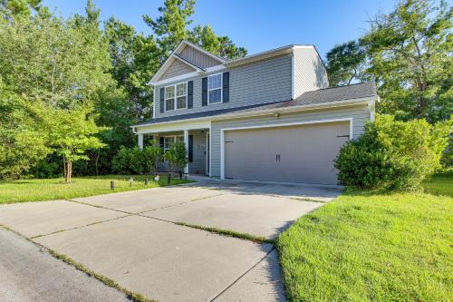 Dog-Friendly Home with Pool Access Near Oak Island!