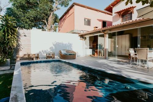 مسبح, Casa Aconchegante com Área Gourmet e Piscina (Casa Aconchegante com Area Gourmet e Piscina) in Barra Do Jucu