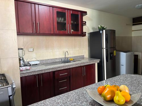 ห้องครัว, Cómodo apartamento con aire puro y vista panorámica ideal para turistas (Comodo apartamento con aire puro y vista panoramica ideal para turistas) in แอมบาโต้