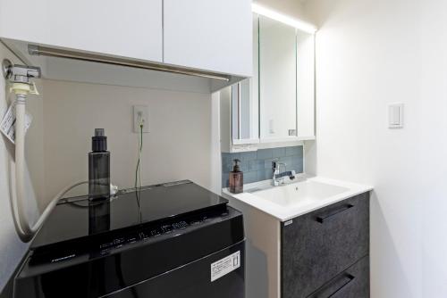 Amp Flat TFK西新駅前 in Nishijin