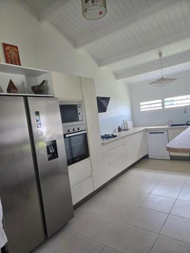 Kitchen, Maison confortable a Baie-Mahault avec jardin privatif in Baie-Mahault