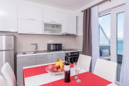 virtuve, Apartments Poseidon in Sreser