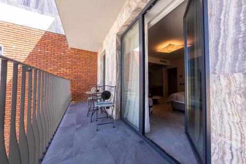 ระเบียง/ชานเรือน, ONE Hotel in อัลบา ลูเลีย