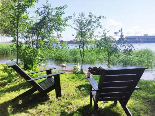 Minimalist riverside hideout, Riga (Foto 3)
