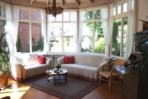 Delt lounge/TV-område, Landhaus Martens in Pruchten