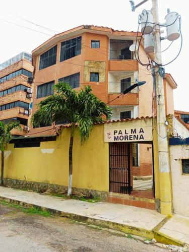 Arena, Mar y Amaneceres para Siete frente a Farmatodo tucacas in Tucacas