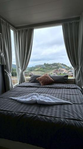 Rai Rak Doi Phutubberk near Phu Hin Rong Kla National Park