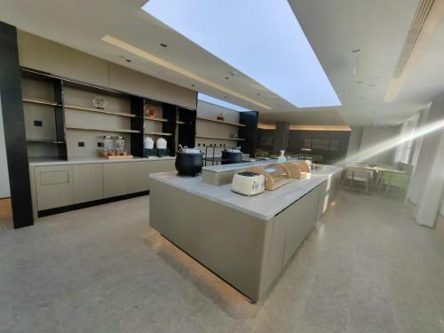 万信至格酒店库尔勒二师医院新四中店